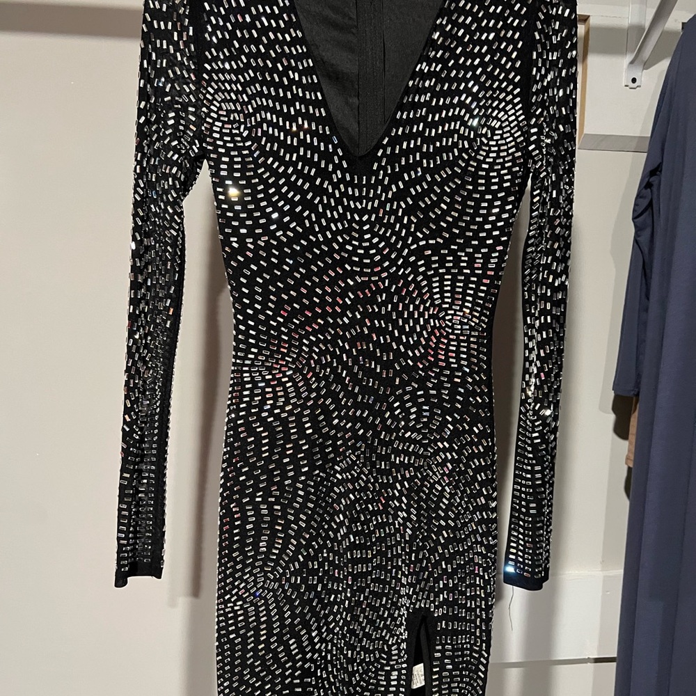 nice evening dress, worn once, black with silver crystals all over,medium